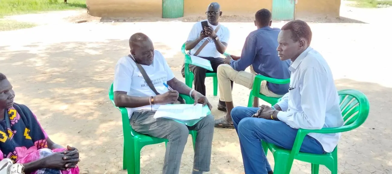Enumerators conducting household interviews during baseline data collection.